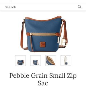 New Dooney and Bourke crossbody with dust cover.  Never used